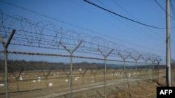 Ограждение на границе Северной Кореи и Южной Кореи.