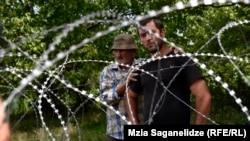 Behind barbed wire at the line of occupation in Georgia
