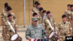 U.S. General Ray Odierno addressing a ceremony marking the pullout of British troops from Iraq in May