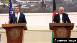 U.S. Defense Secretary Ash Carter (left) made his remarks at a press conference with Afghan President Ashraf Ghani (right) during a previously unannounced visit to Afghanistan.