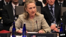 U.S. Secretary of State Hillary Clinton addresses participants at a NATO foreign ministers meeting in Chicago on May 21. 