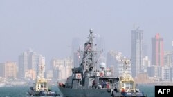 The US Patrol Coastal ship USS Tempest (PC 2) transits from Khalifa Bin Salman Port to Mina Salman Pier in Bahrain on July 3, 2013. The arrival of Tempest, USS Thunderbolt (PC 12) and USS Squall (PC 7) brings the total number to eight PCs here to support 