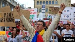 Акции протеста против открытия в Румынии крупнейшего в Европе прииска проходят уже несколько недель. Бухарест, 1 сентября 2013 года.