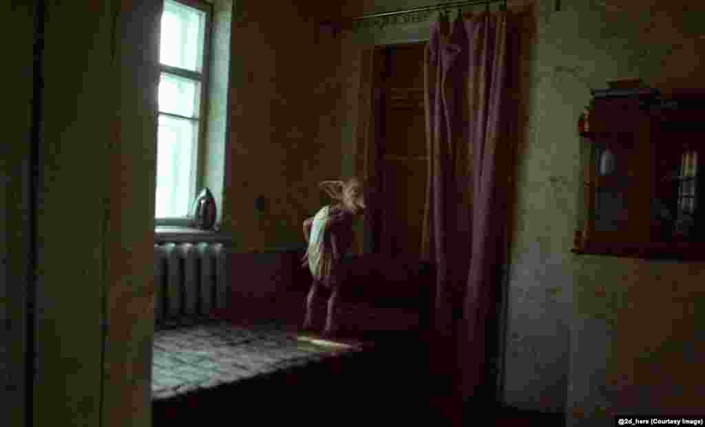 Dobby the house elf, from the Harry Potter series, in a Soviet apartment. 