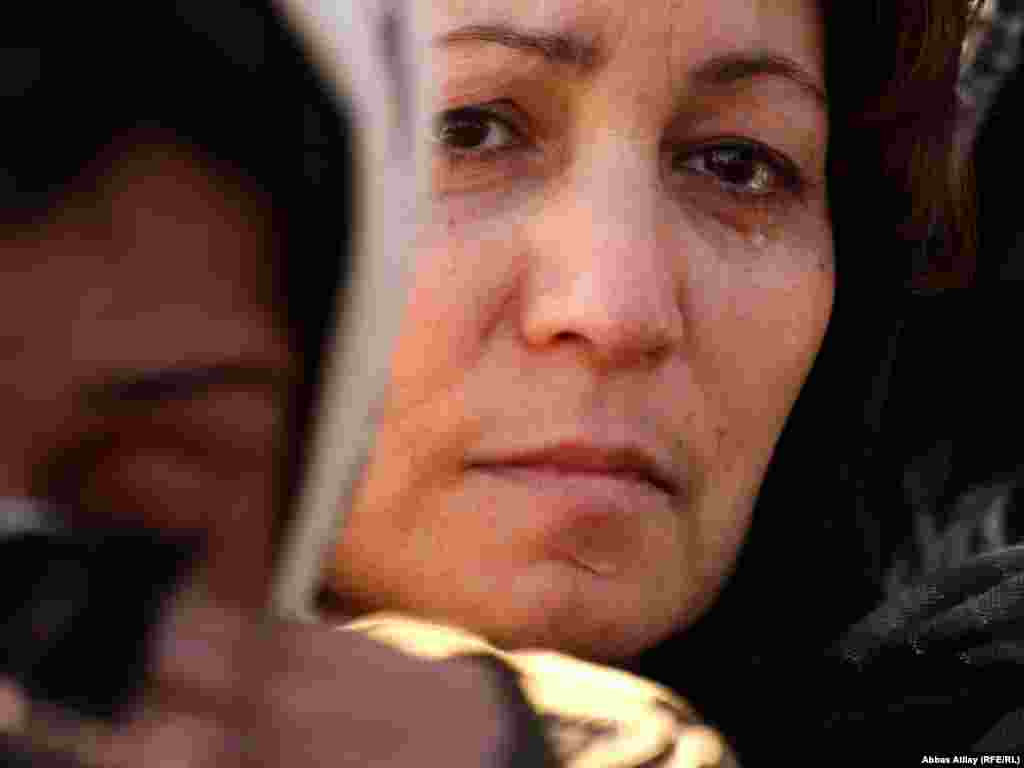 A Shi'ite woman mourns during an Ashura procession at the Taza Pir Mosque in Baku, Azerbaijan, in 2009.