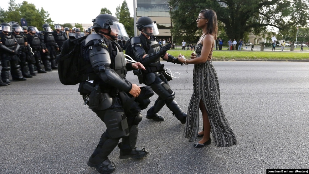 Ieshia Evans became a symbol of the Black Lives Matter movement in the United States after her arrest during a protest in Baton Rouge. Reuters photographer Jonathan Bachman, who captured the moment, told a colleague that "I turned and looked over my right shoulder and saw this woman standing in the road. I knew right away what was about to happen. "I quickly moved and took the shot. When I came back to my car and looked through my take I knew I had a strong image," he was quoted as saying by the news agency. "However, I didn't anticipate that the image would go viral. I am grateful that it has stimulated a discussion about an important issue in this country."