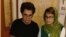 Iran -- dissidents Jafar Panahi (left) and Nasrin Sotoudeh sign their letter to South African antiapartheid icon Nelson Mandela, undated
