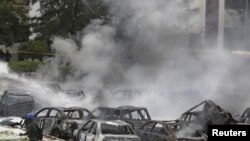 Место теракта у полицейского участка в Абудже, 16 июня 2011 г.
