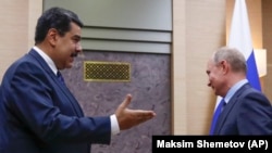 Rusiya Prezidenti Vladimir Putin (sağda) və Nicolas Maduro Moskvada, 5 dekabr, 2018-ci il