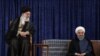 A handout photo made available by the Supreme leader official website shows Iranian president Hassan Rouhani (R) and Iranian supreme leader Ali Khamenei (L) at Rouhani's confirmation ceremony, August 3.