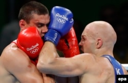 Yevgeny Tishchenko of Russia (left) was awarded the gold over Vassily Levit of Kazakhstan at the Rio Olympics in 2016, despite spending much of the fight on the defensive.