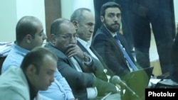 Armenia -- Former President Robert Kocharian (second from right) and his lawyers attend a court hearing in Yerevan, January 9, 2020.