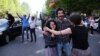 Protesters celebrate at an antigovernment rally in central Yerevan on April 23.