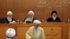 Guardian Council members; Mahmoud Hashemi Shahroudi (R), and Ahmad Jannati (C), attending a session of Assembly of Experts in 2015.