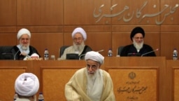Guardian Council members; Mahmoud Hashemi Shahroudi (R), and Ahmad Jannati (C), attending a session of Assembly of Experts in 2015.