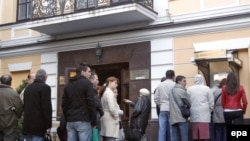 Depositors at an ATM in Kyiv in early October.