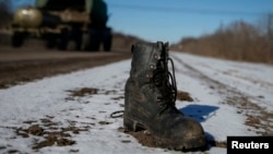 A military boot is seen on the road near Debaltseve, eastern Ukraine, on February 17.