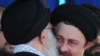 Khomeini Grandson Heckled As Khamenei, Ahmadinejad Warn Reformists