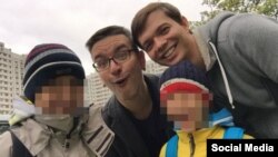 LGBT activists says Andrei Vaganov (left), Yevgeny Yerofeyev, and their children are currently in the United States. (file photo) 