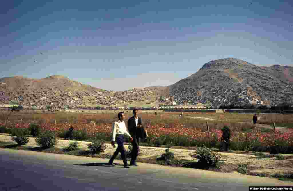 Young boys walk home on the outskirts of Kabul.