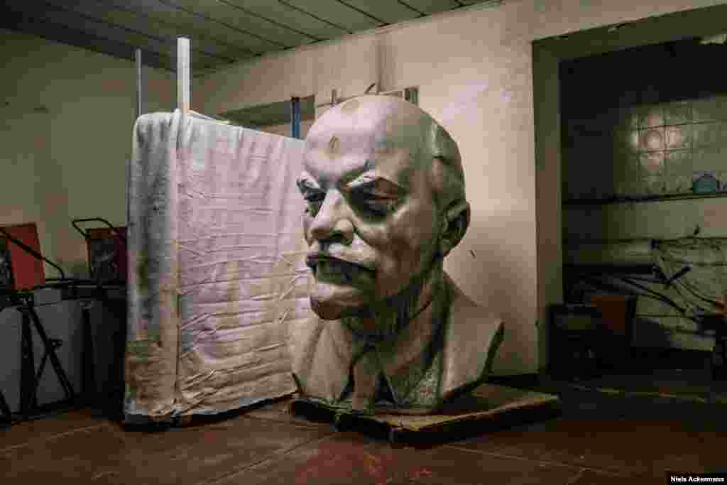 A giant Lenin in a storage room in Chernobyl.&nbsp;Ackermann was initially told by the local authorities that the head was too radioactive to be safely photographed.&nbsp; 