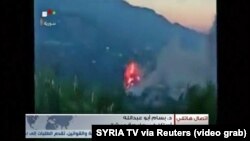 Syrian TV image from 2018 showing an Israeli airstrike hit a military post near the city of Misyaf in Hama Province.