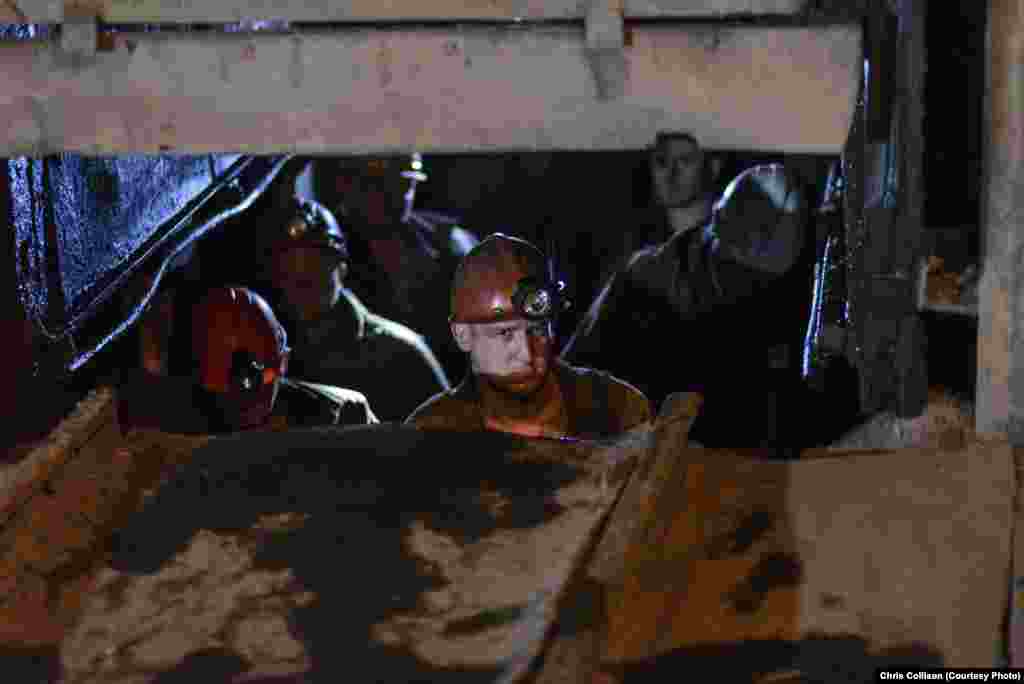 Miners return to the surface after completing their shifts at the Ukraina mine. In July, miners here went on hunger strike to protest the government’s failure to secure their regular salaries.