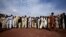 FILE: Internally displaced men from tribal areas line-up to be registered by aid agencies.
