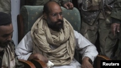 Saif al-Islam Qaddafi after his capture, in the custody of revolutionary fighters in Obari, in November 2011