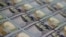 U.S. - Newly redesigned $100 notes lay in stacks at the Bureau of Engraving and Printing in Washington, DC, May 20, 2013.