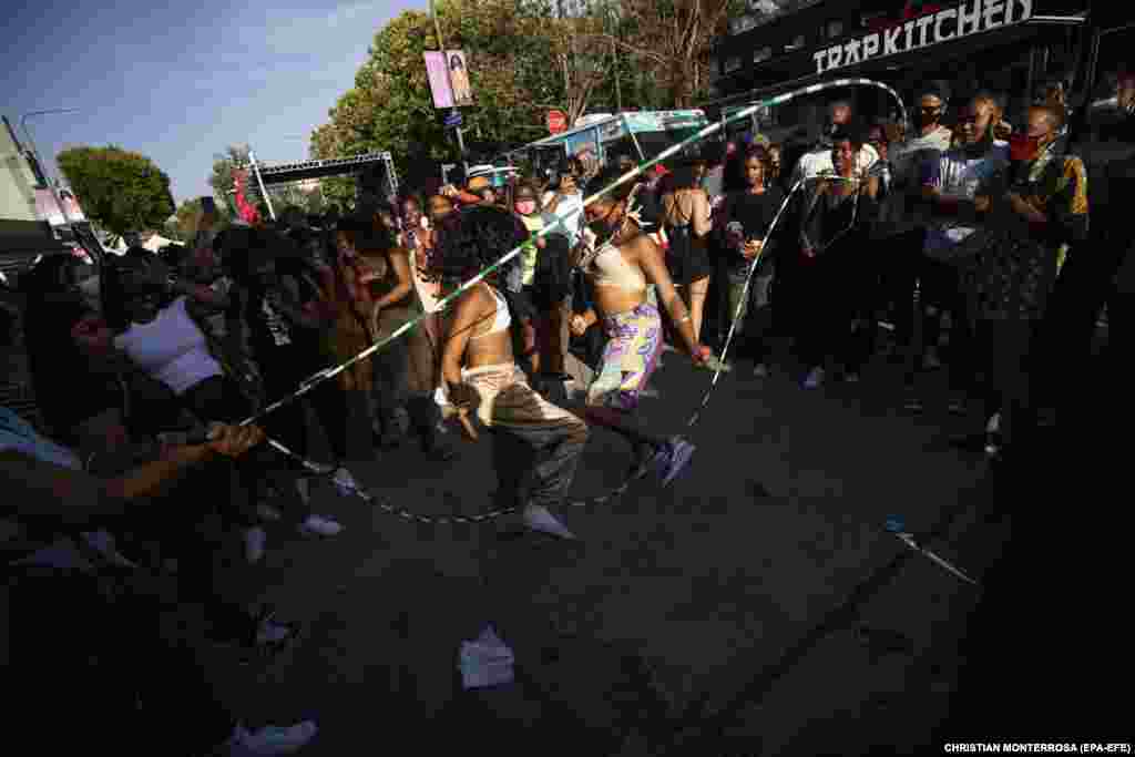  People jump rope during a Juneteenth holiday celebration in Los Angeles, California, USA, 19 June 2020. 