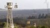 A view of the Golan Heights with Israeli-Syrian border visible.