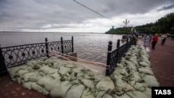 Protective sandbags are piled up as a precaution against the Amur River bursting its banks in Khabarovsk on August 19.