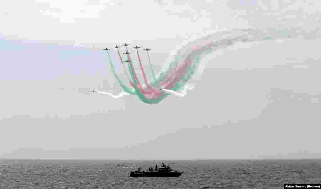 Pakistan Air Force jets perform to celebrate the first anniversary Operation Swift Retort, in which two Indian jets were shot down over Kashmir on February 27. 2019. (Reuters/Akhtar Soomro)