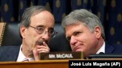 In this archive photo of February 13, 2019, the President of the Foreign Affairs Committee of the House of Representatives, Democrat Eliot Engel (L) talking with his Republican colleague Michael McCaul, during a hearing in Washington. 