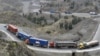 Cargo trucks drive through the mountainous area near Torkham by Afghanistan's border with Pakistan. (file photo)