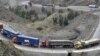 Trucks drive through the mountainous area near Torkham by Afghanistan's border with Pakistan. (file photo)