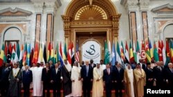 U.S. President Donald Trump, Saudi Arabia's King Salman bin Abdulaziz Al Saud, and Arab leaders pose for a photo during Arab-Islamic-American Summit in Riyadh, May 21, 2017