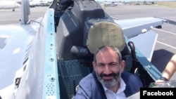 Armenia - Prime Minister Nikol Pashinian sits in the cockpit of a Su-30SM fighet jet,17June, 2018