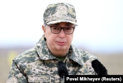 Interim Kazakh President Qasym-Zhomart Toqaev delivers a speech as he attends military exercises in the Almaty region on May 3.