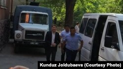 Сапар Исаков (слева). 31 июля 2018 года.