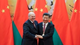 Predsednik Belorusije Aleksandar Lukašenko (levo) s predsednikom Kine Si Đinpingom u Pekingu, septembar 2016.