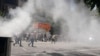 پلیس با پرتاب گاز اشک‌آور به تجمع اعتراضی مقابل مجلس یورش برد