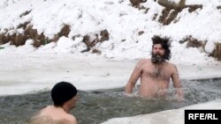 Russian 'walrus' swimmers celebrate Epiphany in freezing cold water in 2008.