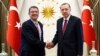 Turkish President Recep Tayyip Erdogan (right) meets with U.S. Defense Secretary Ash Carter at the Presidential Palace in Ankara on October 21.