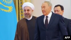 Қазақстан президенті Нұрсұлтан Назарбаев (сол жақта) пен Иран президенті Хассан Роухани. Астана, 9 қыркүйек 2014 жыл.