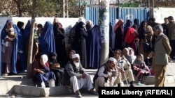 Afghans vote in parliamentary elections near Kabul on October 20.