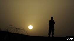 An Afghan soldier stands at a checkpoint in Khost Province. (file photo)