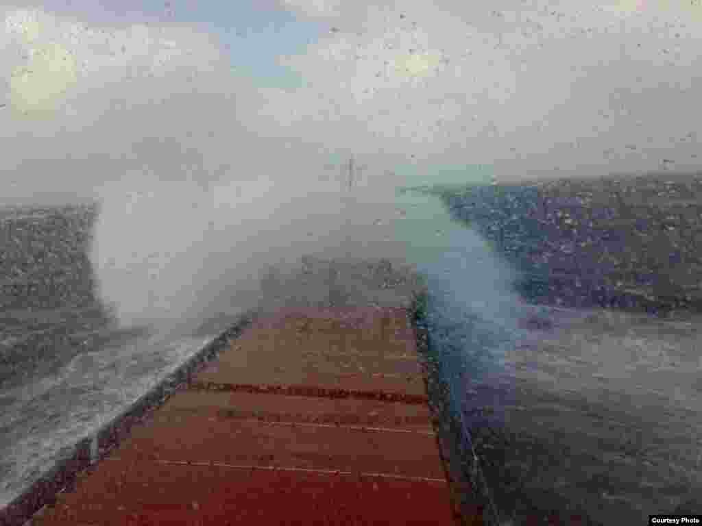 The deck of the "Vasilios N" during a Mediterranean storm in April 2010 - Just a day after setting out from Antalya, the "Vasilios N" encountered a severe storm near the Greek island of Karpathos, with strong winds and high swells that washed over the deck. The crew was forced to drop anchor and wait out the storm for three days. When the weather cleared, the crew realized some of the cargo had sustained water damage.