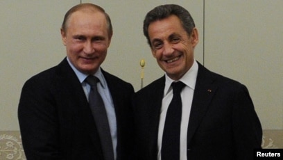 Vladimir Putin (solda) və Nikola Sarkozy, 2016, Moskva
